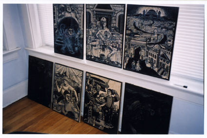 Several cut woodblocks arranged for display.